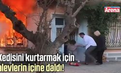 Kedisini kurtarmak için alevlerin içine daldı!