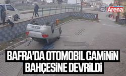 Bafra'da otomobil caminin bahçesine devrildi