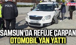 Samsun'da refüje çarpan otomobil yan yattı