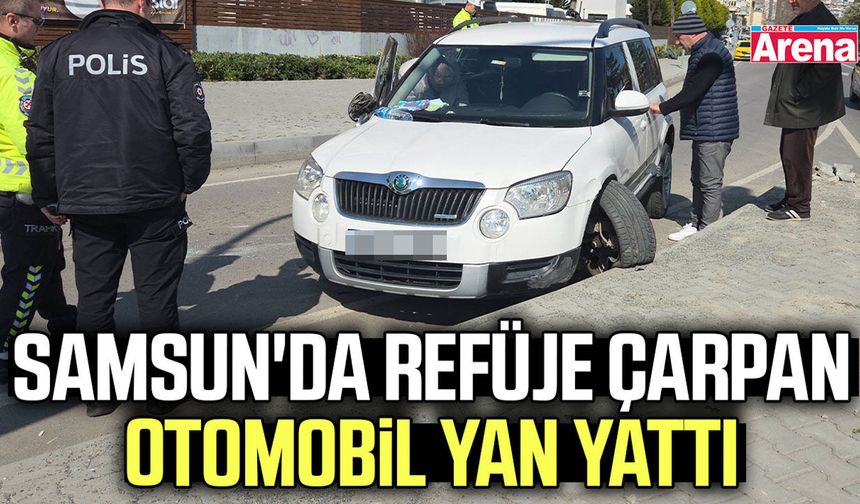 Samsun'da refüje çarpan otomobil yan yattı